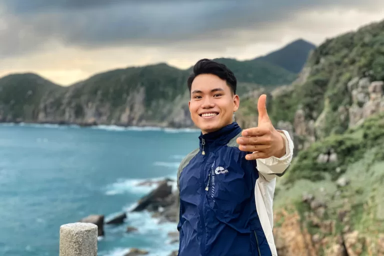 asian man extending his hand