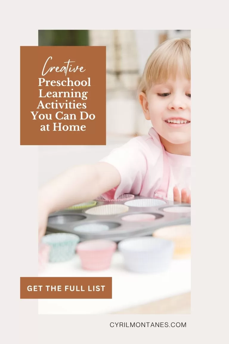 Young child smiling while placing colorful cupcake liners into a muffin tray, with text overlay that reads “Creative Preschool Learning Activities You Can Do at Home – Get the Full List – cyrilmontanes.com