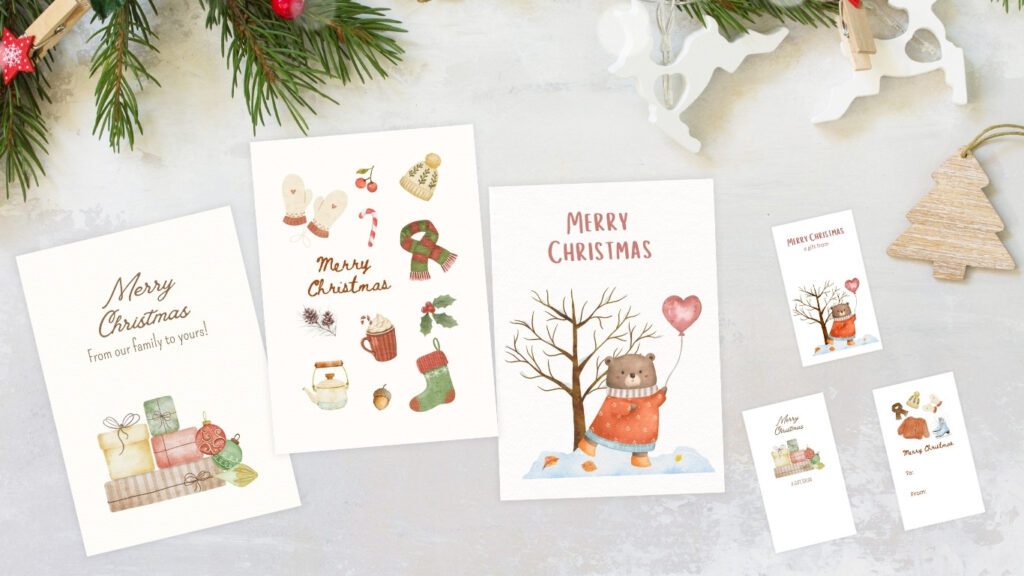Free Christmas printable Christmas cards and gift tags by Cyril Montanes Blog with cozy watercolor designs of presents, bear, and holiday icons.